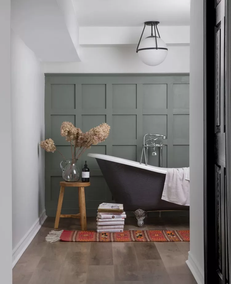 Clawfoot bathtub with olive wainscoting-Ashley Montgomery Design