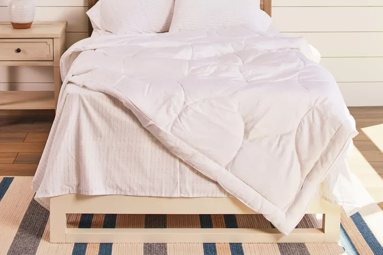 Buffy Cloud comforter spread across a made bed