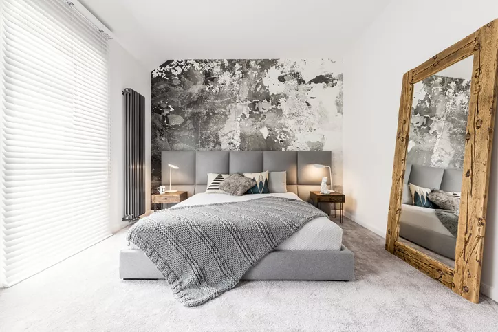 Small Primary Bedroom Ideas Add a Floor-Length Mirror KatarzynaBialasiewicz via Getty Images