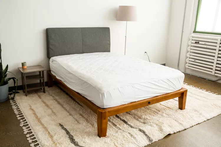 Cozy Earth bamboo viscose mattress pad on a made bed