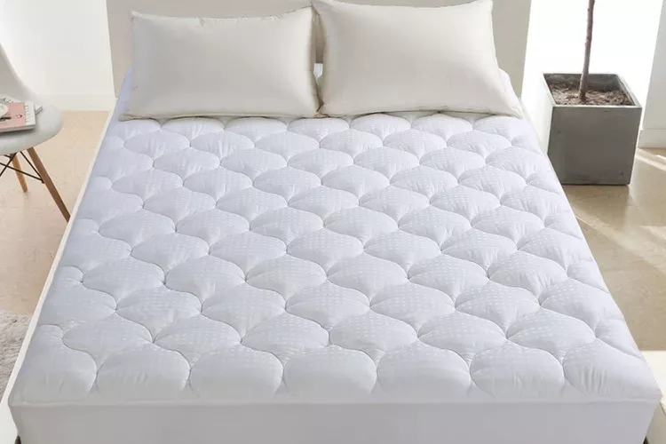 Leisure Town mattress pad in gray on a bed