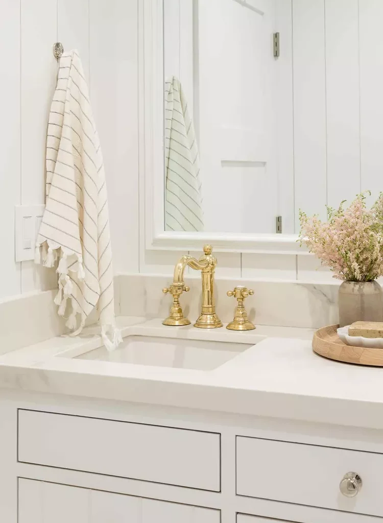 25 White and Gold Bathroom Ideas for a Luxe Look-13 Statement Faucet