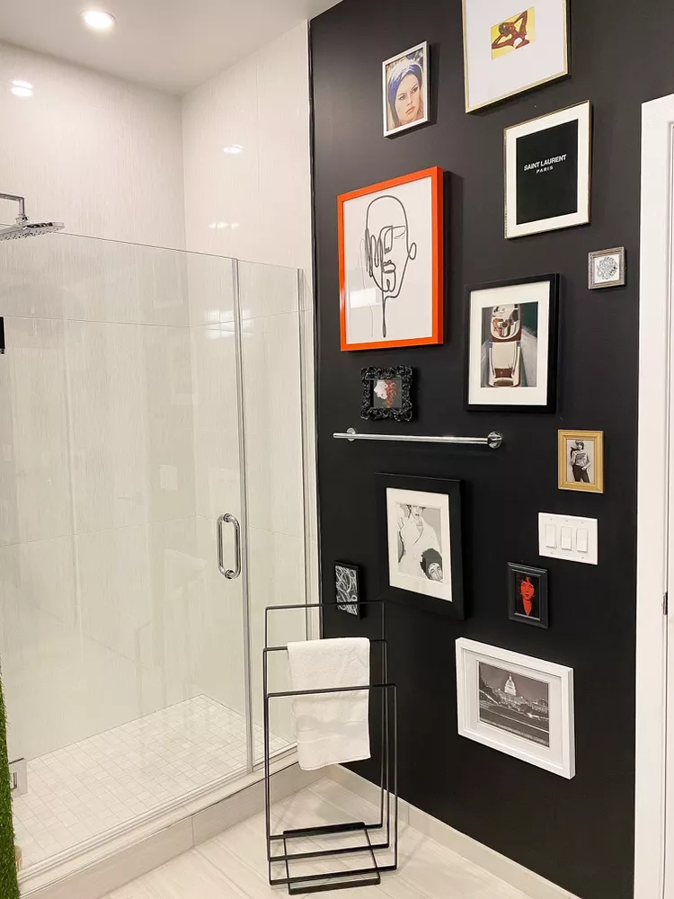 Black Bathroom Ideas for a Chic, Moody Space-Hang a Gallery Wall