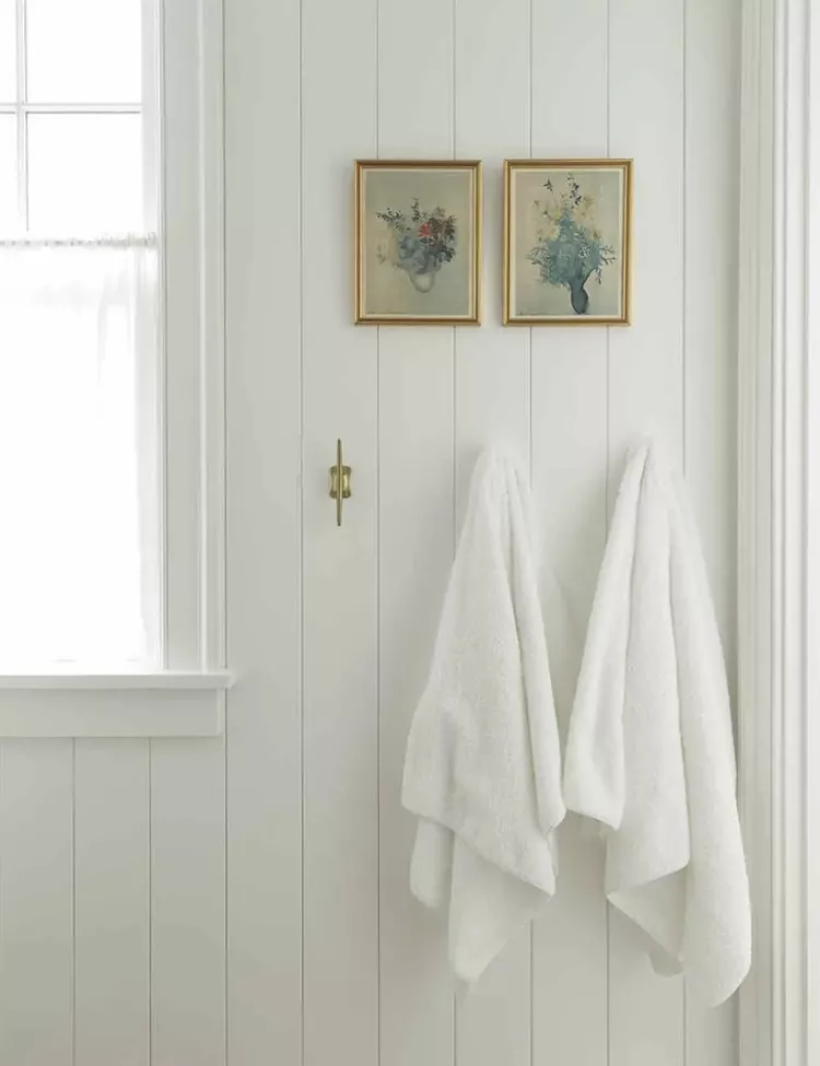  White Bathroom Ideas-28 Soften Your Space With Personal Touches