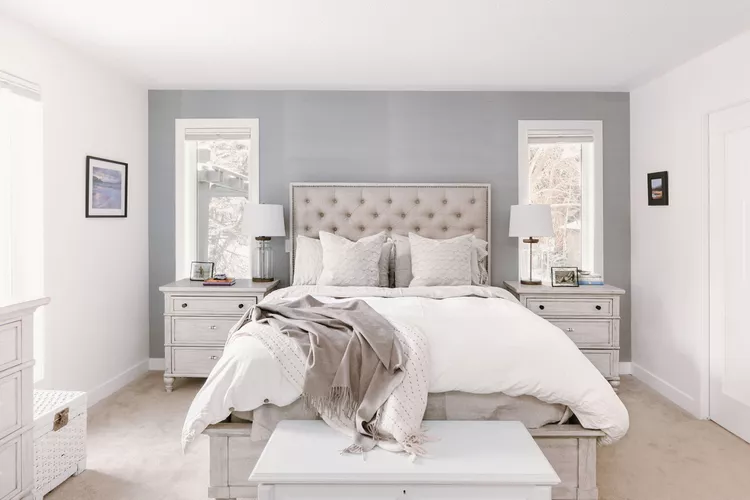 Gray and White Bedroom Ideas for a Timeless, Calming Space-07 Style a Tufted Gray Headboard